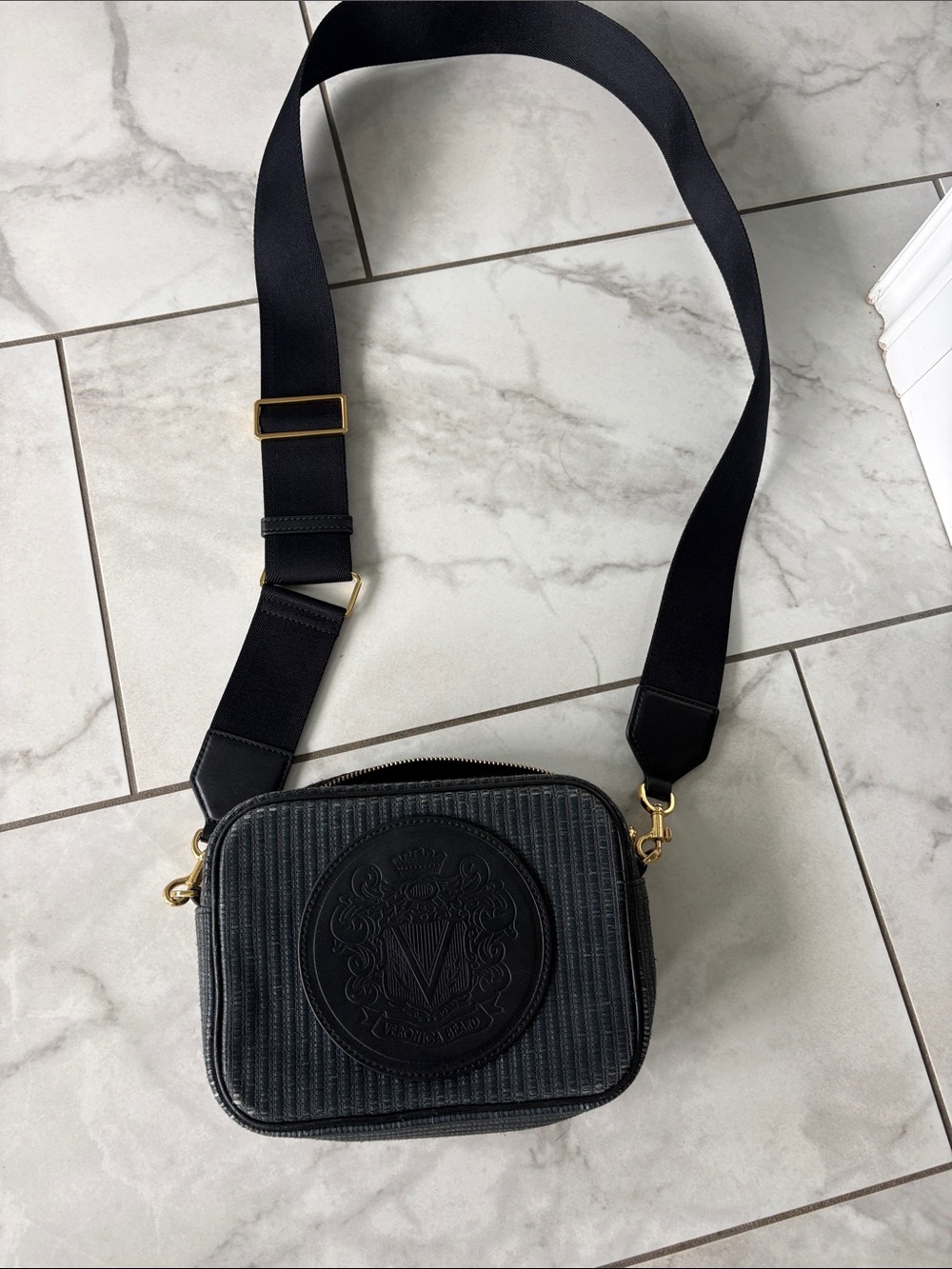 Veronica Beard Black Embossed Crest Crossbody Bag with Wide Strap